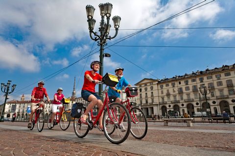 Group of cyclists at the Piazza Vittorio Veneto in Turin